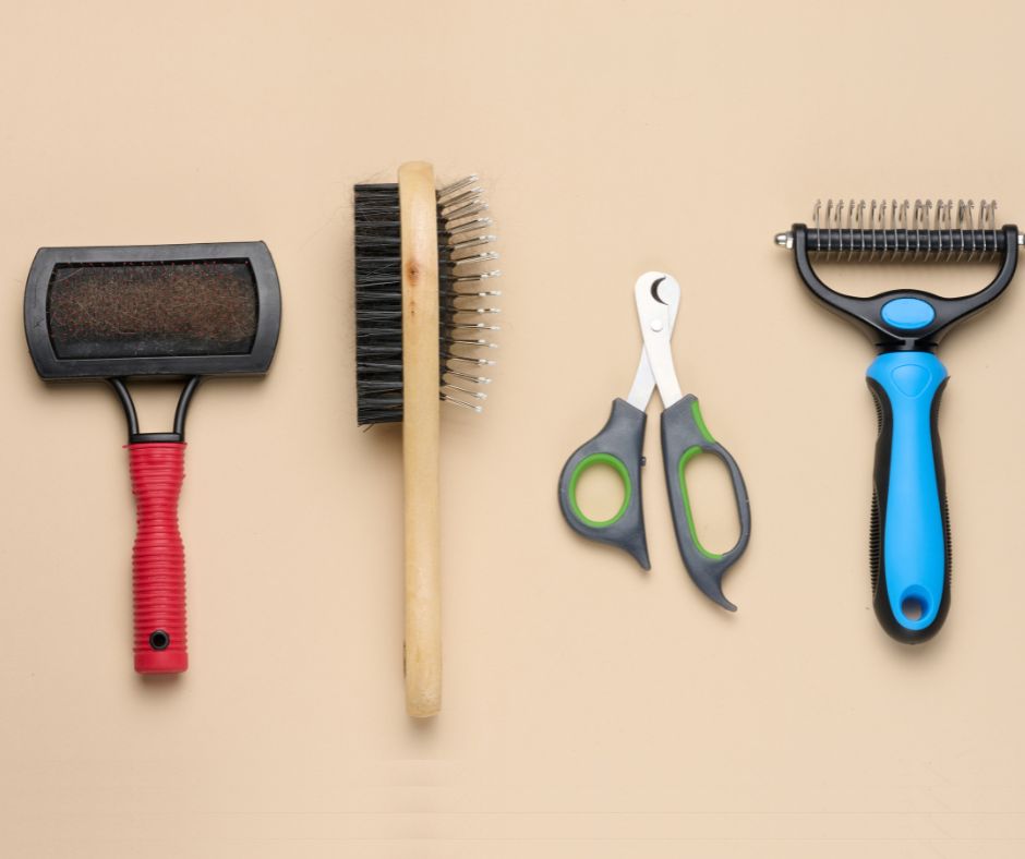 collection of cat brushes on a table