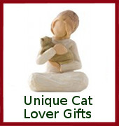 figurine of woman holding cat